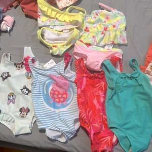 Bathing suits from target and H&M for baby girl size 6-9m and 12m